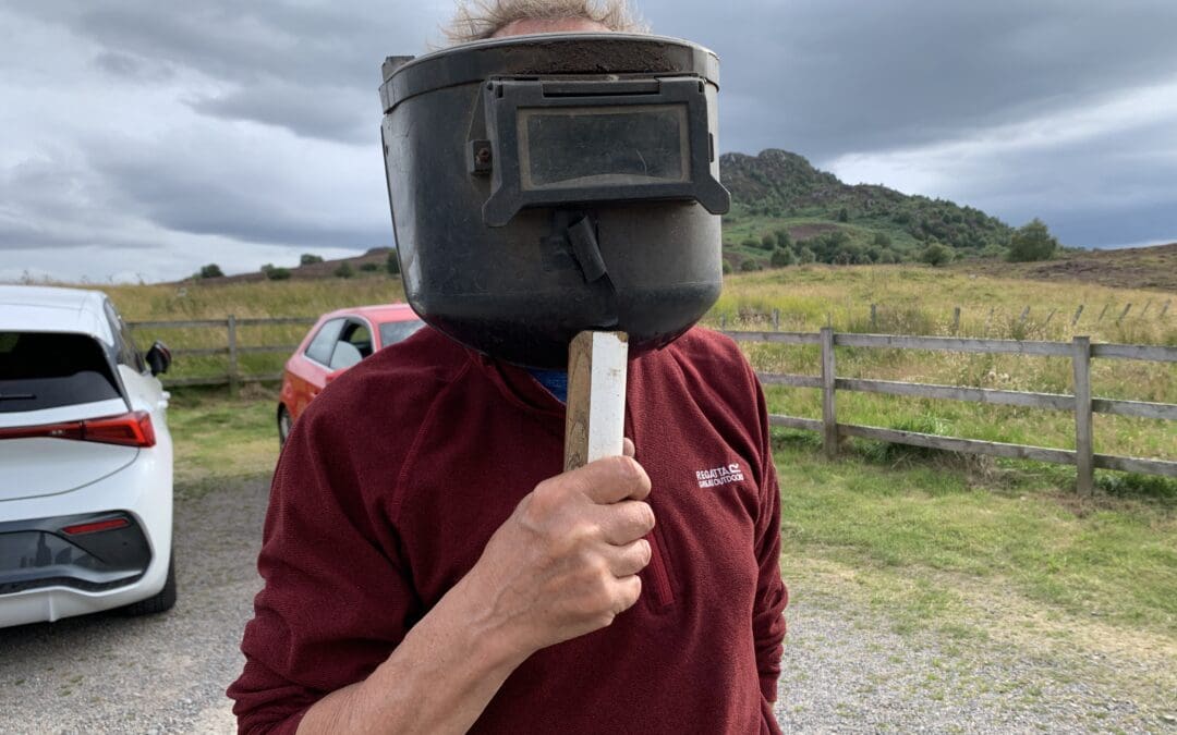 Conquering a Cairn with a Colander to Experience the Eclipse